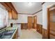 Laundry room with lots of cabinet storage, utility sink, washer, and dryer connections at 2830 Wire Rd, Saint George, SC 29477