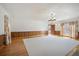 Large open living room showcasing hardwood floors, decorative trim, and natural light from a large window at 2830 Wire Rd, Saint George, SC 29477