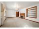 Spacious living room features a fireplace and built-in shelving at 2830 Wire Rd, Saint George, SC 29477
