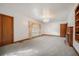 Bright living room featuring a decorative chandelier and a cozy fireplace at 2830 Wire Rd, Saint George, SC 29477