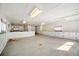 Spacious room with white walls, ample storage cabinets, and bright overhead lighting at 2830 Wire Rd, Saint George, SC 29477