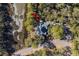 Serene home site aerial view surrounded by lush trees and marshland at 2947 Deer Point Dr, Seabrook Island, SC 29455