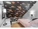 Eclectic bedroom with fish-themed wallpaper, and under window storage at 2947 Deer Point Dr, Seabrook Island, SC 29455