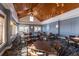 Restaurant space with wood ceiling and plenty of tables and chairs at 2947 Deer Point Dr, Seabrook Island, SC 29455