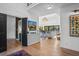 Bright foyer with high ceilings, hardwood floors, a chandelier, and open sightlines to the living area at 2947 Deer Point Dr, Seabrook Island, SC 29455