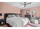 Main bedroom featuring a king-size bed, chic decor, and plenty of natural light at 2947 Deer Point Dr, Seabrook Island, SC 29455