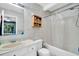 Traditional bathroom featuring a vanity, toilet, shower-tub combo, and a medicine cabinet at 313 Lapwing Ln, Mount Pleasant, SC 29464