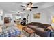 Bright and airy living room with ceiling fans and natural light, perfect for relaxing and entertaining at 313 Lapwing Ln, Mount Pleasant, SC 29464