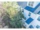 Aerial view of home exterior, patio, roofing and surrounding greenery at 393 Flyway Rd, Goose Creek, SC 29445