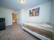 Inviting bedroom with carpeted floors and a view into the hallway at 393 Flyway Rd, Goose Creek, SC 29445