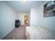 Bright bedroom with carpet, TV, and neutral decor, creating a relaxing space at 393 Flyway Rd, Goose Creek, SC 29445
