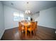 Inviting dining room with hardwood flooring and a chandelier at 393 Flyway Rd, Goose Creek, SC 29445