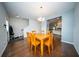 Hardwood floor dining room next to staircase and kitchen at 393 Flyway Rd, Goose Creek, SC 29445