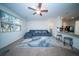 Cozy living room featuring comfortable seating, a ceiling fan, and a view of the kitchen at 393 Flyway Rd, Goose Creek, SC 29445