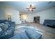 Spacious living room with plush couches, a stylish rug, and inviting neutral décor at 393 Flyway Rd, Goose Creek, SC 29445