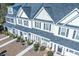Aerial shot of townhomes displaying tidy lawns, personal entrances, and a clean layout at 393 Flyway Rd, Goose Creek, SC 29445