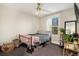 Cozy bedroom featuring a metal bed frame and window at 5135 Park Creek Avenue, North Charleston, SC 29418
