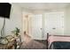 Bedroom with a pink blanket, and en-suite bathroom at 5135 Park Creek Avenue, North Charleston, SC 29418