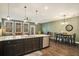 Open concept kitchen with island seating and dining area at 5135 Park Creek Avenue, North Charleston, SC 29418