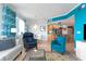 Bright living room with colorful accents and an open floor plan at 5804 Palmetto Dr # A-401/403, Isle of Palms, SC 29451