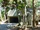 Serene wooded view of the villa offering a private and tranquil retreat at 619 Magnolia Walk Villas, Edisto Island, SC 29438