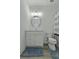 A bright bathroom with a vanity, toilet, and shower at 637 N Laurel St # 75, Summerville, SC 29483