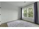 A bedroom with two windows and hardwood floors at 637 N Laurel St # 75, Summerville, SC 29483