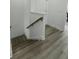 Bright hallway featuring wood floors and white doors at 637 N Laurel St # 75, Summerville, SC 29483