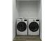 Convenient laundry area featuring side-by-side, modern, high-efficiency washer and dryer units at 637 N Laurel St # 75, Summerville, SC 29483