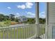 Scenic view from the balcony showcasing well-maintained lawns and the neighborhood at 637 N Laurel St # 75, Summerville, SC 29483