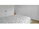 This bedroom features white walls, light-colored flooring and two closets with large doors at 637 N Laurel St # 75, Summerville, SC 29483
