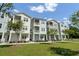 Charming apartment units with covered entrances, vibrant lawns, and scenic sidewalk access at 637 N Laurel St # 75, Summerville, SC 29483