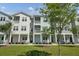 Beautiful apartment complex featuring covered porches, lovely greenery, and stunning architectural detail at 637 N Laurel St # 75, Summerville, SC 29483