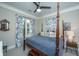 Serene bedroom with a king-size bed and elegant decor at 788 Awendaw Lakes Blvd, Awendaw, SC 29429