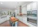 Spacious kitchen with double ovens, granite counters, and an island at 788 Awendaw Lakes Blvd, Awendaw, SC 29429