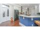 Elegant kitchen with stainless steel appliances and a large island at 788 Awendaw Lakes Blvd, Awendaw, SC 29429