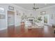 Bright living room with hardwood floors, fireplace and French doors at 788 Awendaw Lakes Blvd, Awendaw, SC 29429
