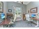 Two-person office with window, hardwood floors, and modern computers at 788 Awendaw Lakes Blvd, Awendaw, SC 29429