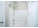 Clean shower with a white surround and double shower heads at 788 Awendaw Lakes Blvd, Awendaw, SC 29429