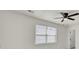Bright bedroom with ceiling fan, window blinds, and large closet at 7897 Sabalridge Dr, North Charleston, SC 29418