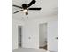 Bedroom with ceiling fan and access to bathroom at 7897 Sabalridge Dr, North Charleston, SC 29418