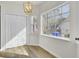 Dining area with hardwood floors, a window, and white built-ins at 7897 Sabalridge Dr, North Charleston, SC 29418