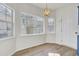 Bright dining area with a large window and chandelier at 7897 Sabalridge Dr, North Charleston, SC 29418