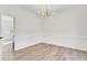 Bright dining room with hardwood floors and chandelier at 7897 Sabalridge Dr, North Charleston, SC 29418