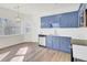 Eat-in kitchen with light walls, wood flooring, and a view from the window at 7897 Sabalridge Dr, North Charleston, SC 29418
