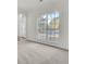 Bright living room with large windows and carpeting at 7897 Sabalridge Dr, North Charleston, SC 29418