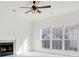 Living room with fireplace, large windows and carpet at 7897 Sabalridge Dr, North Charleston, SC 29418
