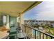 Balcony with partial ocean view and community pool view at 8000 Palmetto Dr # 505, Isle of Palms, SC 29451