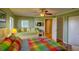 Bedroom with a daybed and colorful bedding at 8000 Palmetto Dr # 505, Isle of Palms, SC 29451