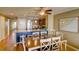 Bright dining area with wooden table and chairs near the kitchen at 8000 Palmetto Dr # 505, Isle of Palms, SC 29451